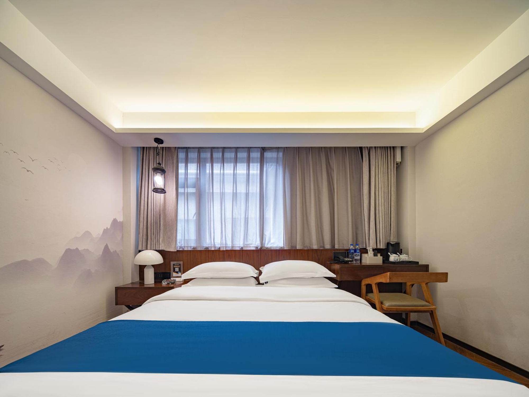 張家界武陵源北岸輕奢客棧 森林公園店 Hotel Zhangjiajie Bagian luar foto