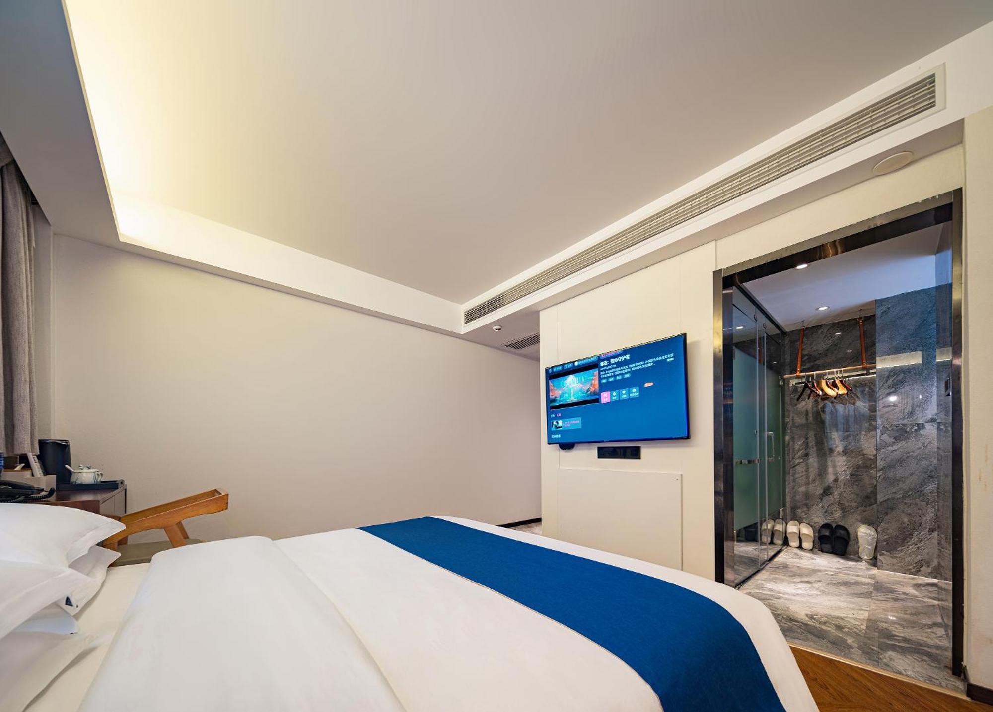 張家界武陵源北岸輕奢客棧 森林公園店 Hotel Zhangjiajie Bagian luar foto