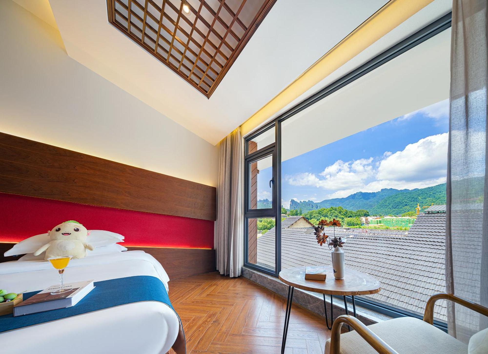 張家界武陵源北岸輕奢客棧 森林公園店 Hotel Zhangjiajie Bagian luar foto