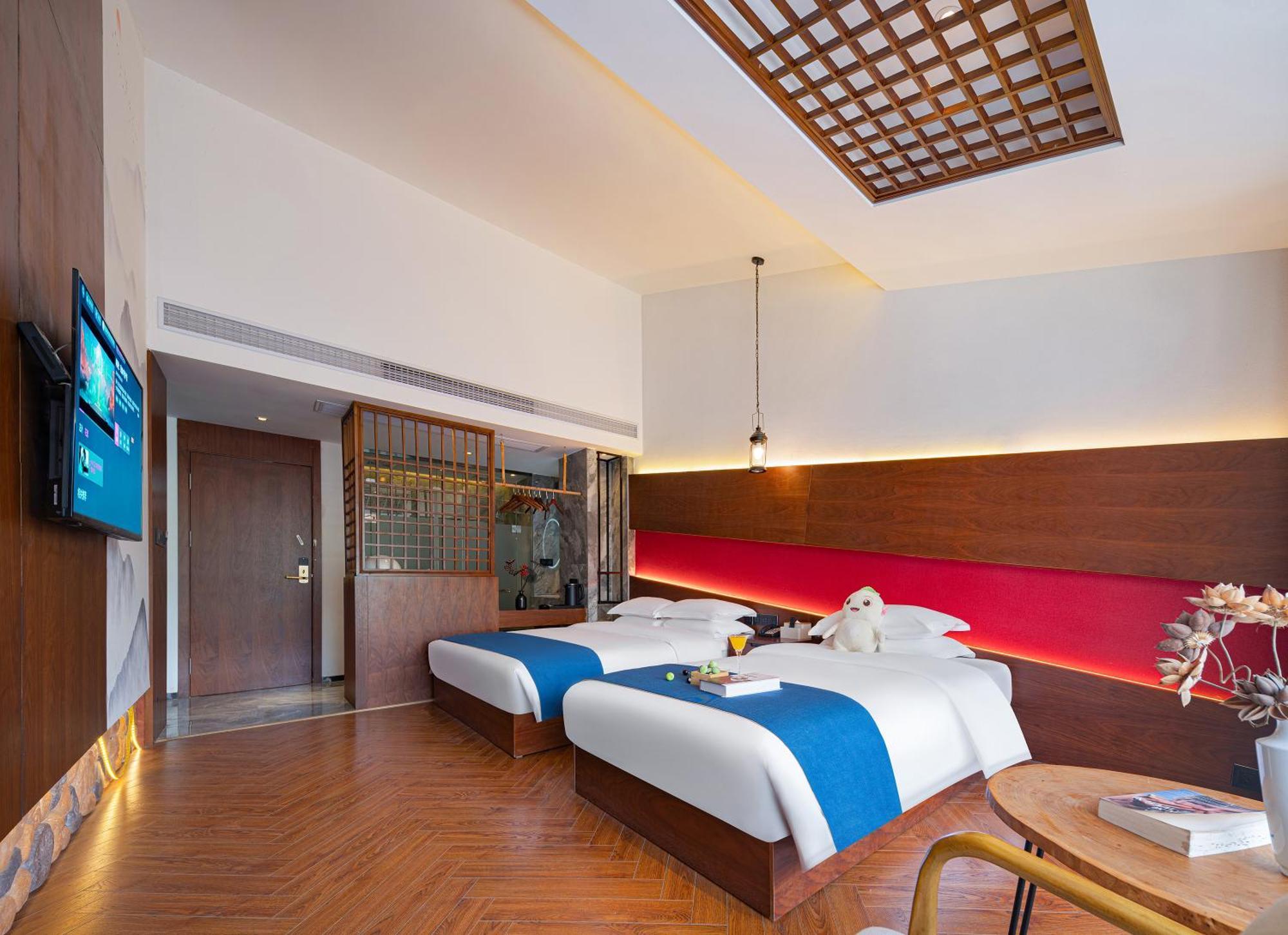 張家界武陵源北岸輕奢客棧 森林公園店 Hotel Zhangjiajie Bagian luar foto