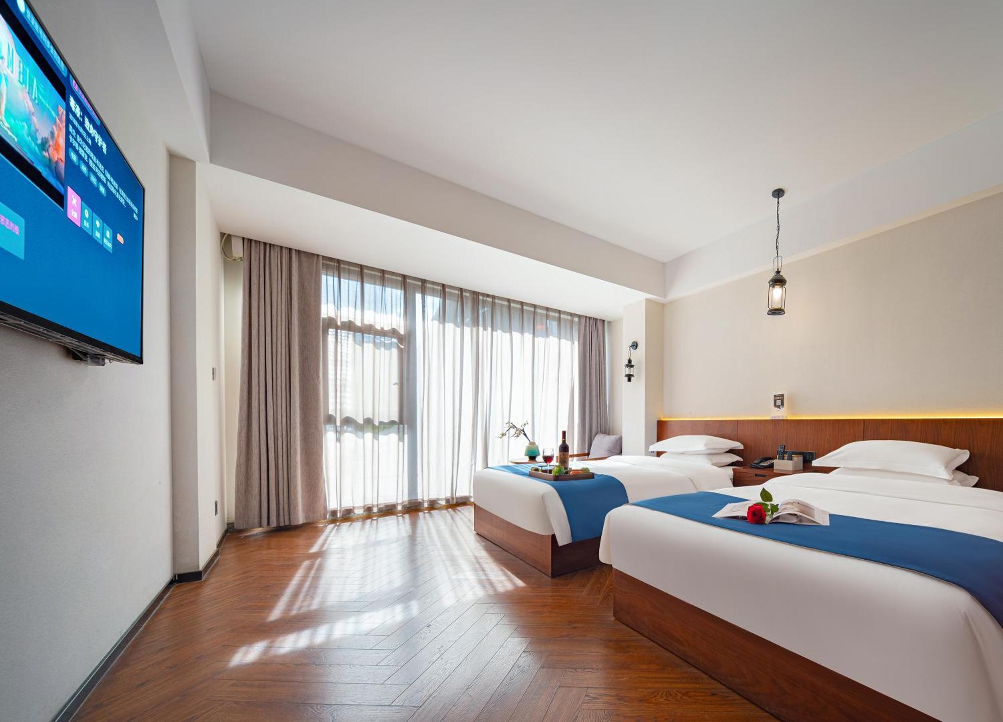 張家界武陵源北岸輕奢客棧 森林公園店 Hotel Zhangjiajie Bagian luar foto