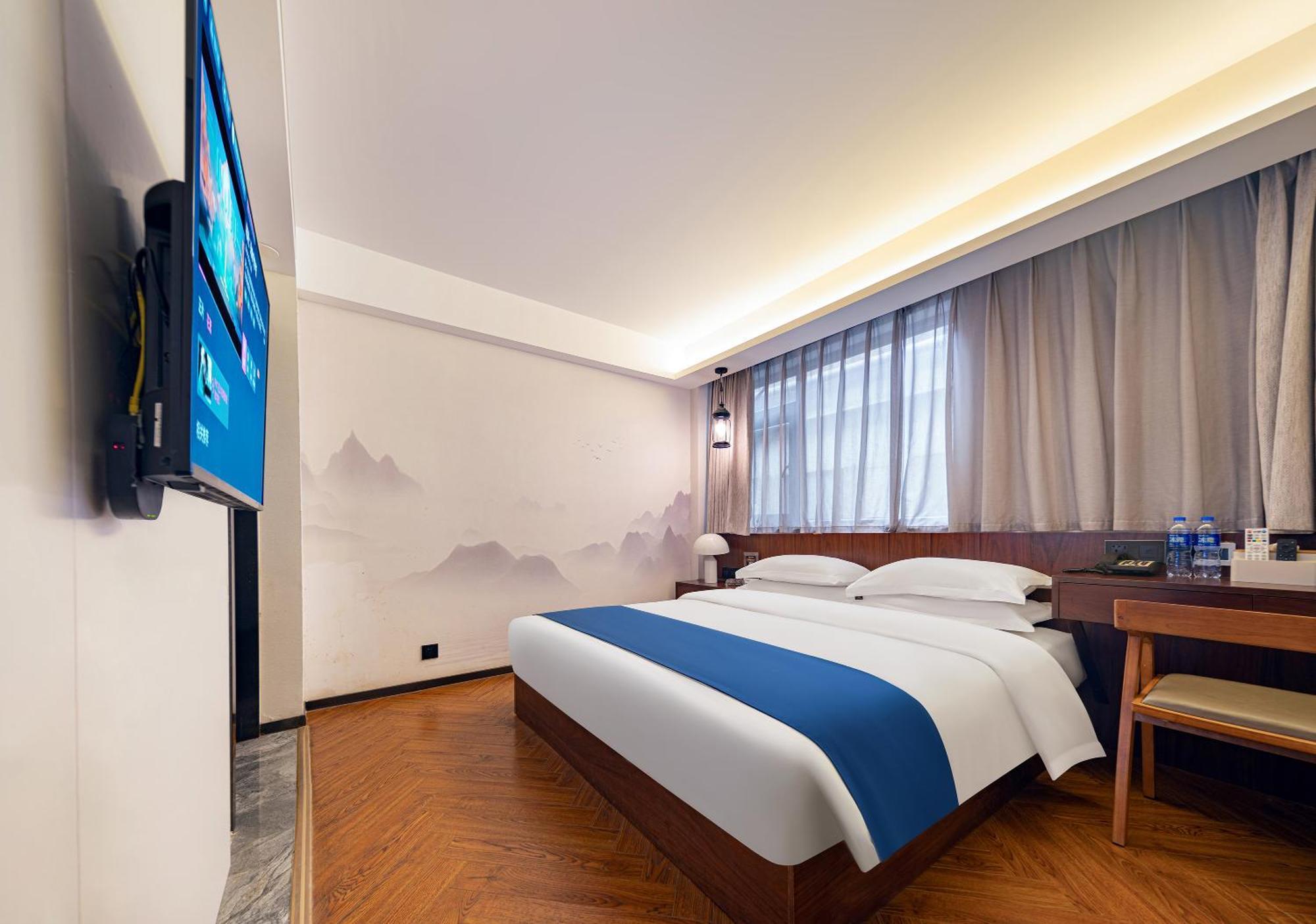 張家界武陵源北岸輕奢客棧 森林公園店 Hotel Zhangjiajie Bagian luar foto