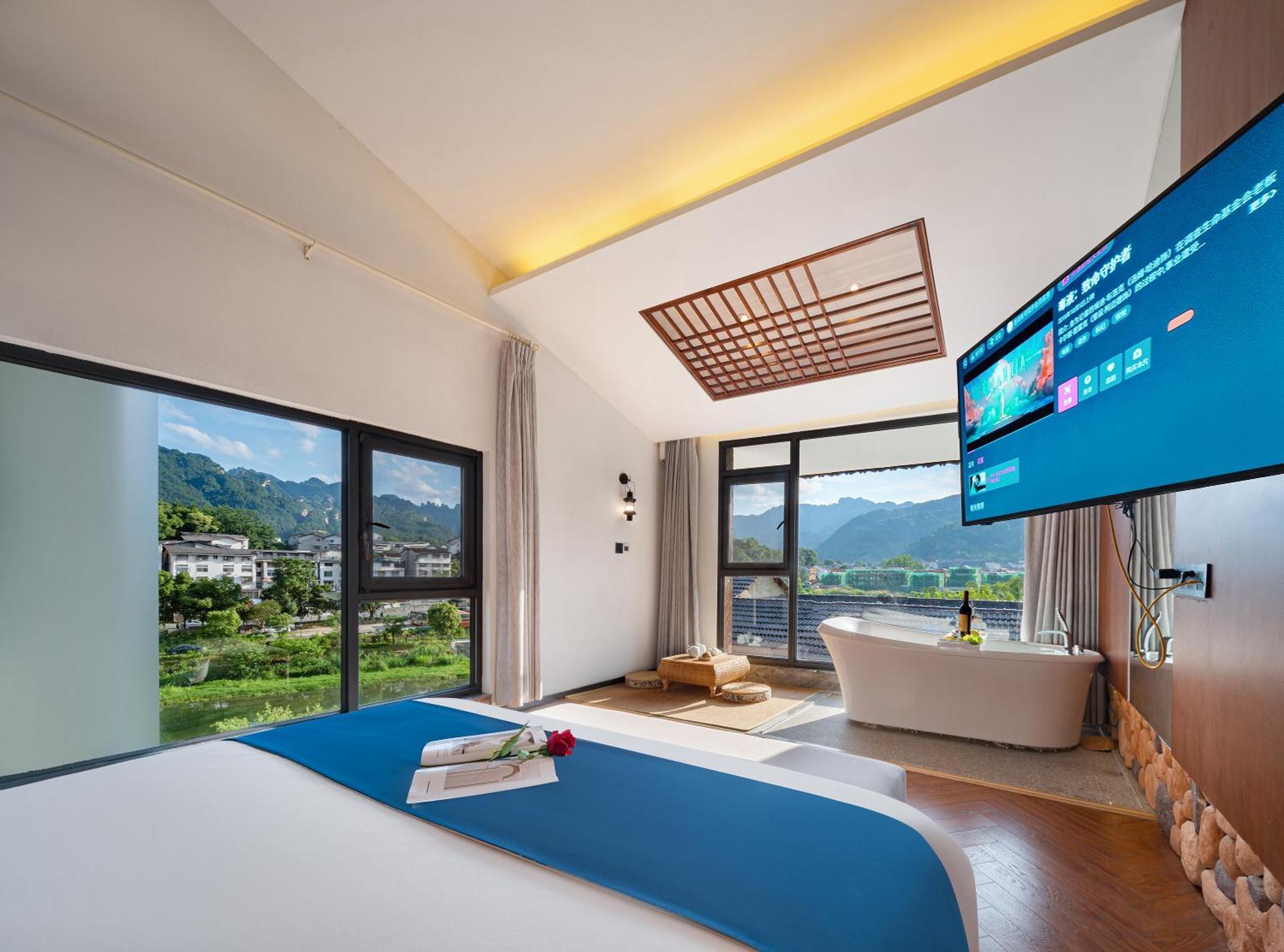 張家界武陵源北岸輕奢客棧 森林公園店 Hotel Zhangjiajie Bagian luar foto