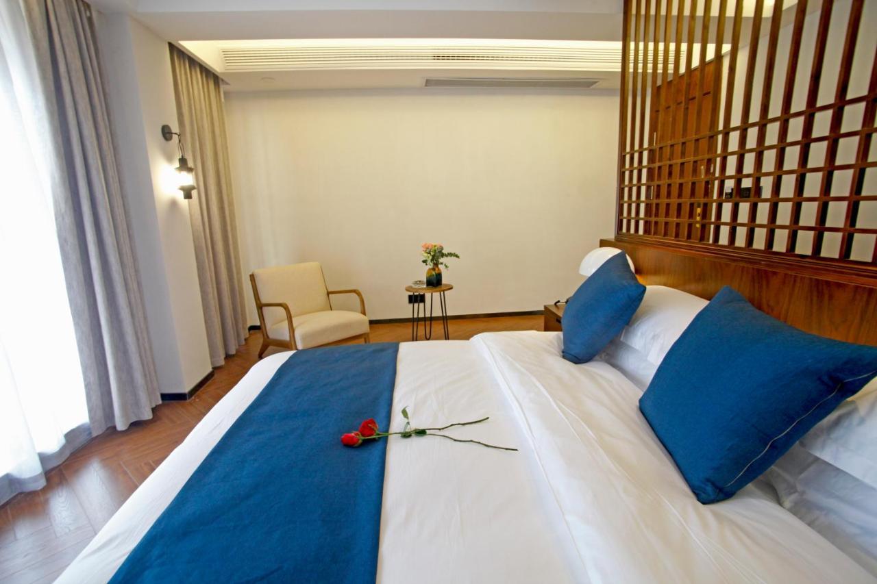 張家界武陵源北岸輕奢客棧 森林公園店 Hotel Zhangjiajie Bagian luar foto