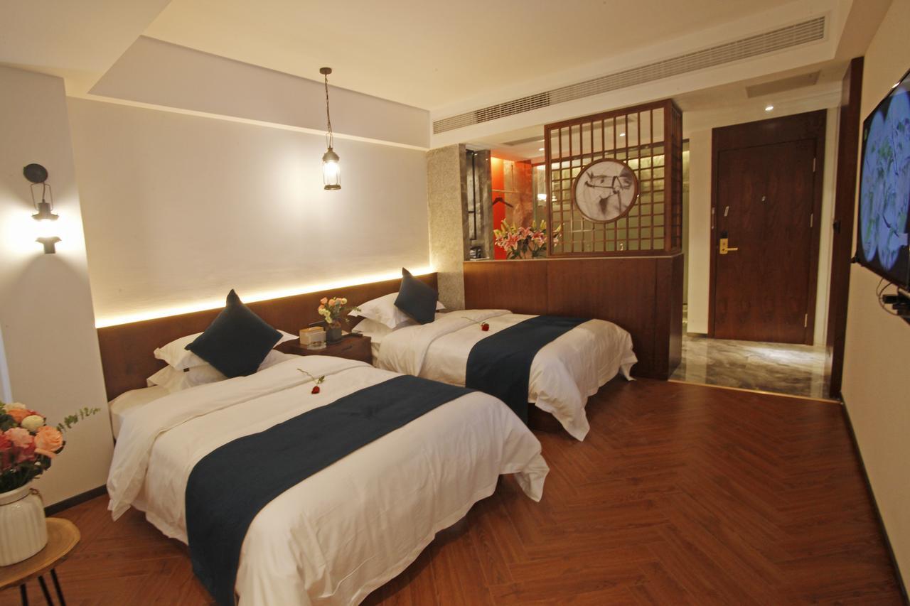 張家界武陵源北岸輕奢客棧 森林公園店 Hotel Zhangjiajie Bagian luar foto
