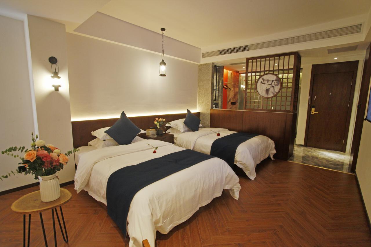 張家界武陵源北岸輕奢客棧 森林公園店 Hotel Zhangjiajie Bagian luar foto