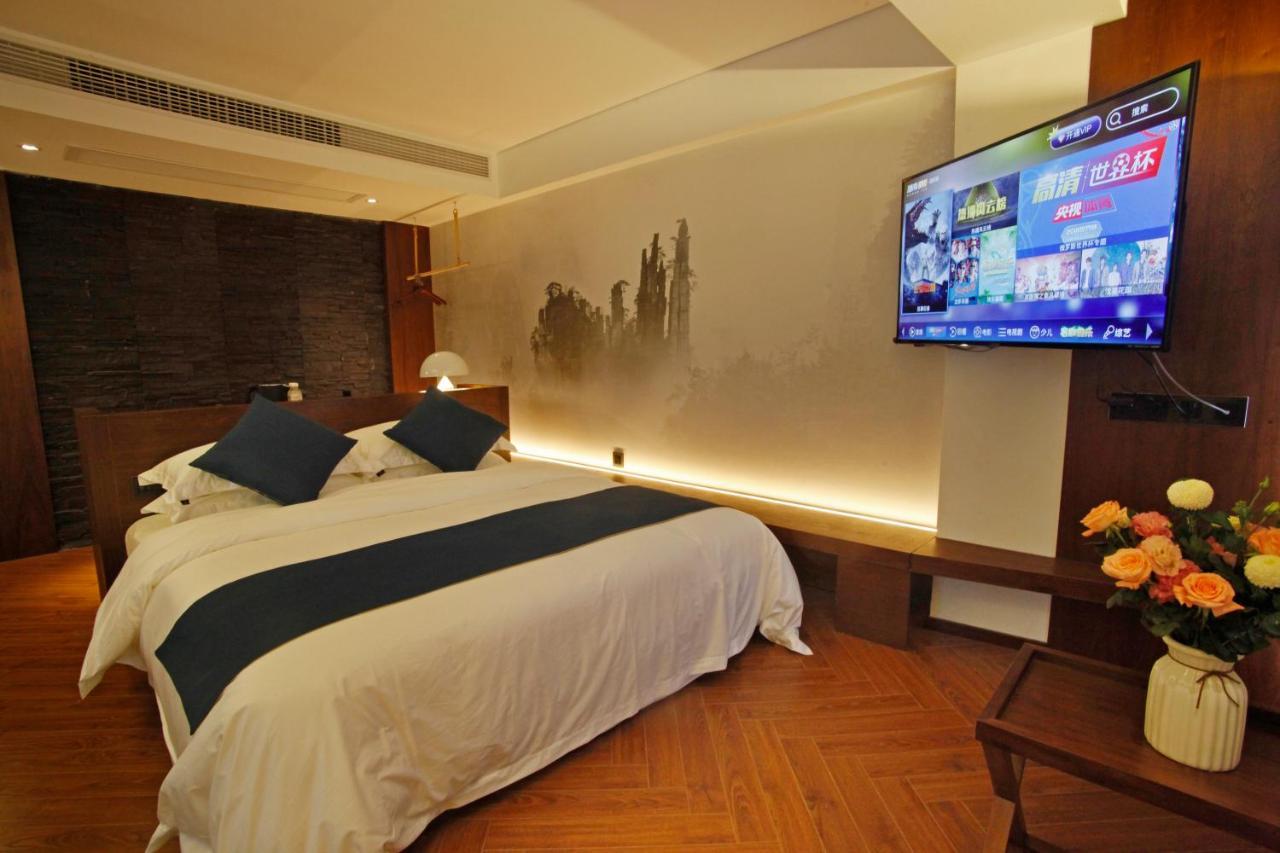 張家界武陵源北岸輕奢客棧 森林公園店 Hotel Zhangjiajie Bagian luar foto