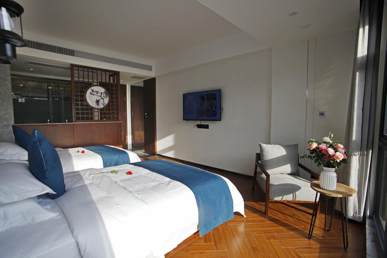張家界武陵源北岸輕奢客棧 森林公園店 Hotel Zhangjiajie Bagian luar foto