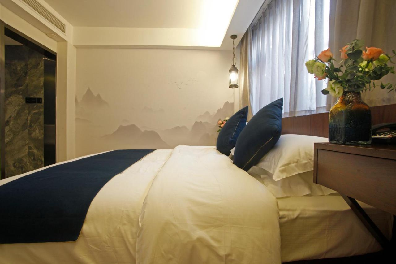 張家界武陵源北岸輕奢客棧 森林公園店 Hotel Zhangjiajie Bagian luar foto