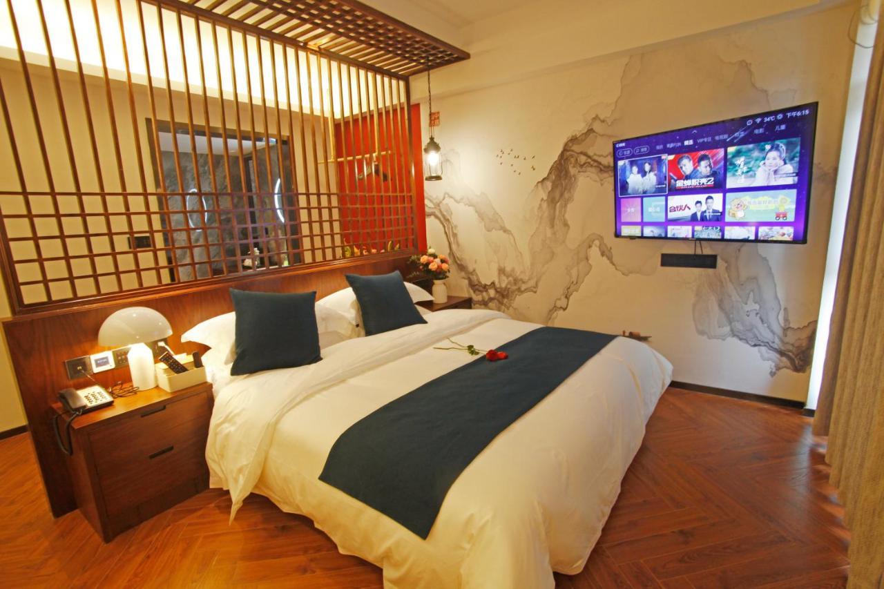 張家界武陵源北岸輕奢客棧 森林公園店 Hotel Zhangjiajie Bagian luar foto