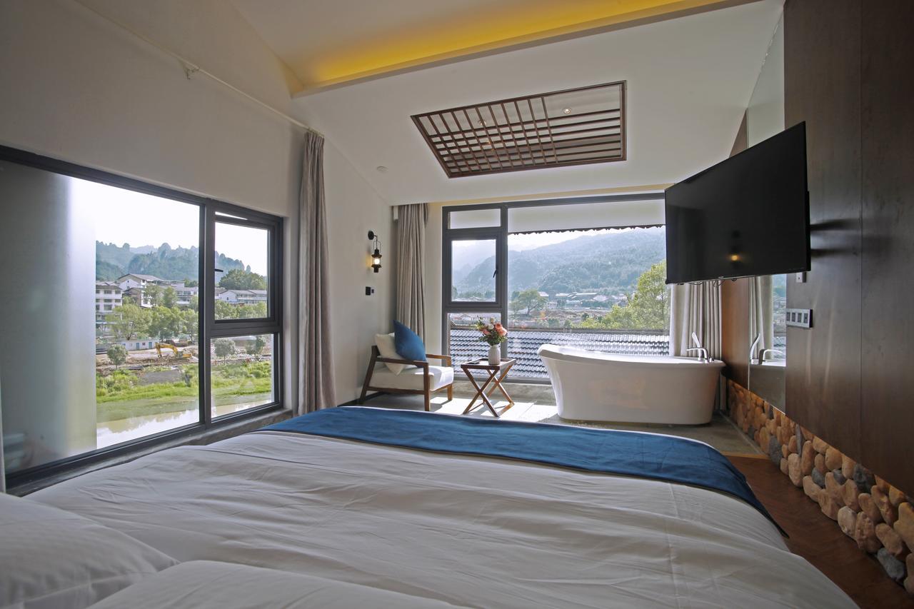 張家界武陵源北岸輕奢客棧 森林公園店 Hotel Zhangjiajie Bagian luar foto